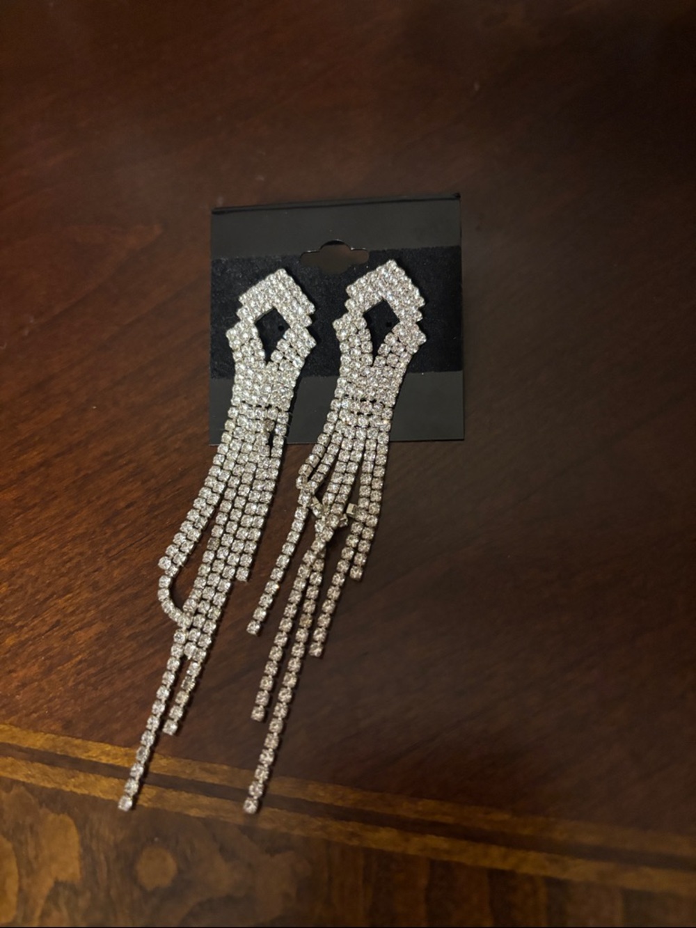 Rhinestone Tassel Drop Earrings - Sparkling Silver pierced ears